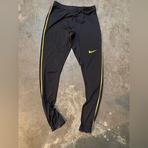 Nike Black Pants with Yellow Accents
